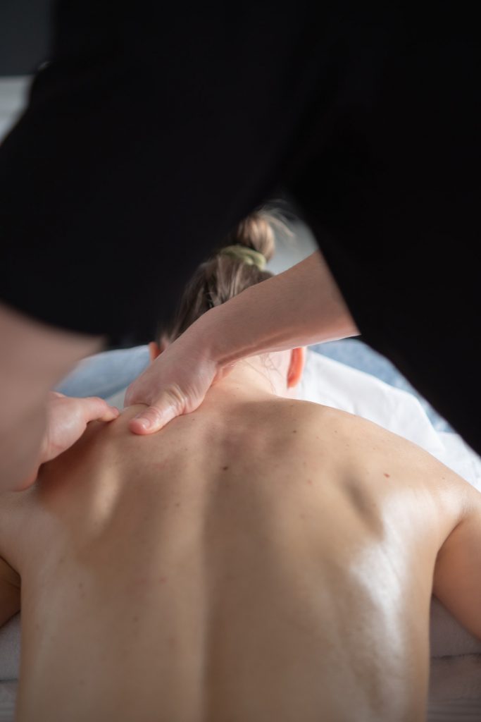 woman getting chiropractic work done on her